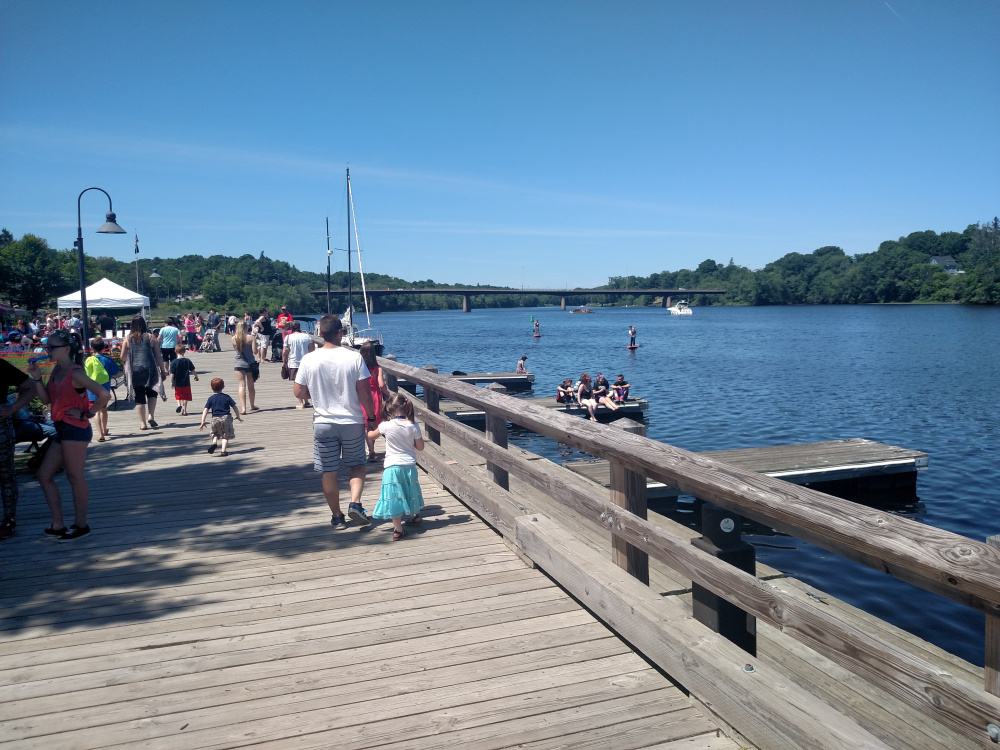 Locals stroll along the waterfront during last year's Greater Gardiner River Festival.