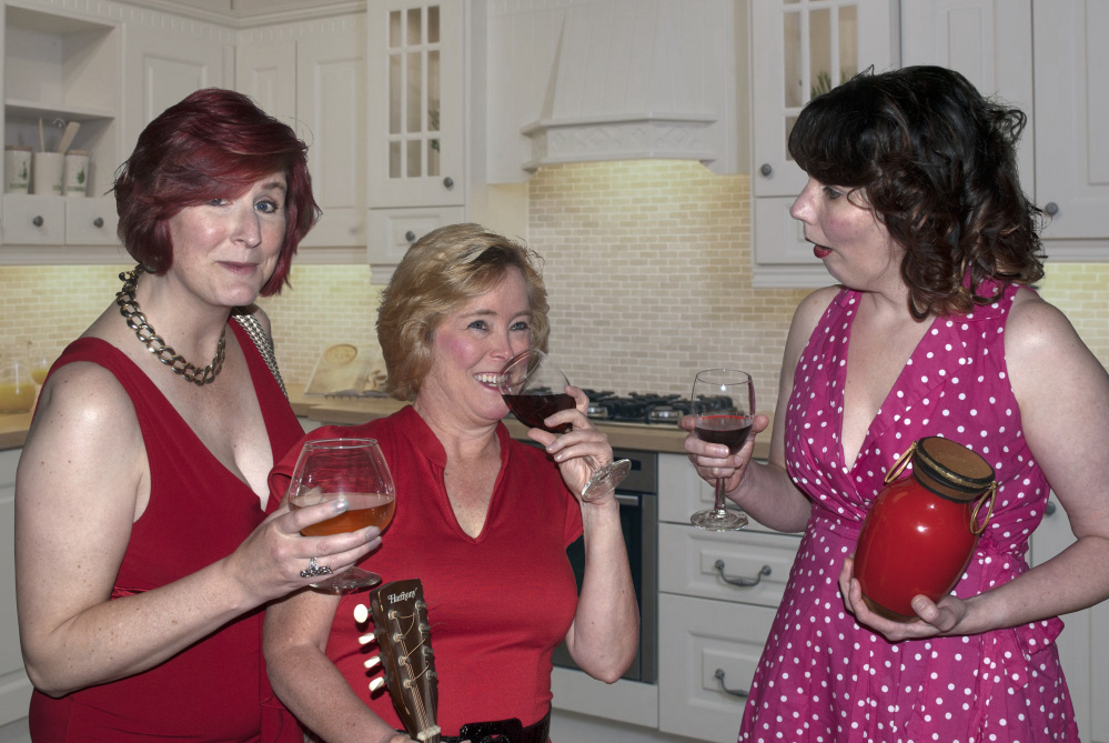 Juli Brooks (Leona), left, Jeralyn Shattuck (Millie) and Elizabeth Chasse-King (Connie) bond over wine in a scene from "Exit Laughing."