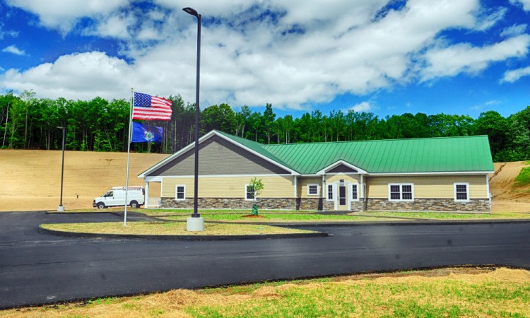 At the new Town Office in Belgrade, shown here in June 2016, former Selectwoman Penny Morrell gathered signatures Tuesday in hopes of putting a question on the fall ballot about removing Belgrade from Regional School Unit 18.