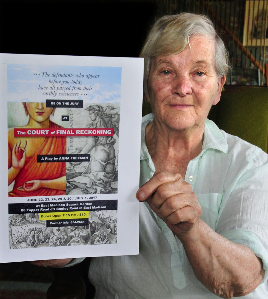 Anna Freeman holds a poster for her play "The Court of Final Reckoning" that she wrote and will direct at the East Madison Square Garden on June 22-24 and June 29-July 1.