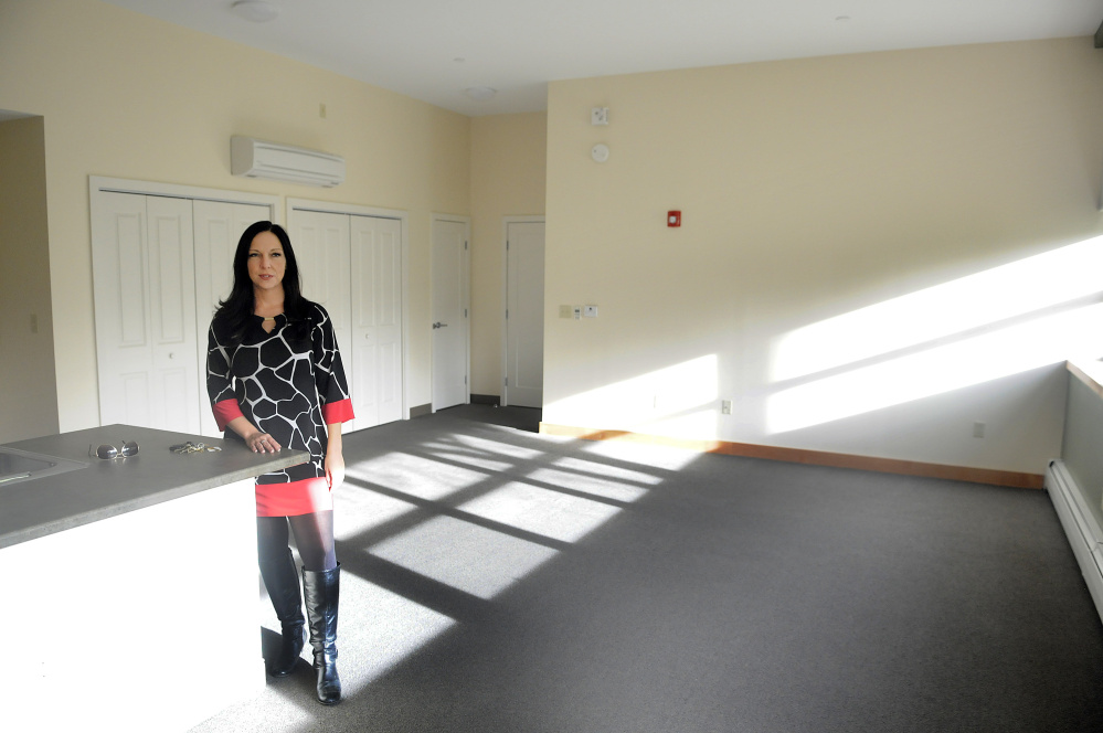 Augusta Housing Authority Director Amanda Bartlett stands in an apartment for rent Nov. 10, 2016, at the former Hodgkins Middle School in Augusta. The agency plans to host an open house for the public Thursday at the former school.