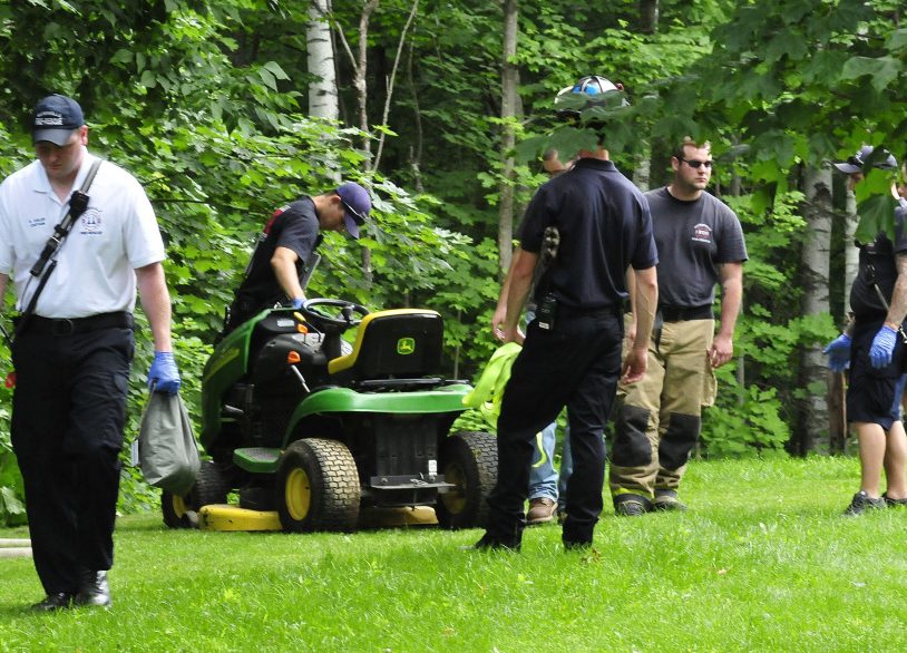 Waterville firefighters helped pull an injured man from a wooded area Wednesday after the lawn mower he was riding toppled down an embankment at 1 Ashley Terrace in Waterville.