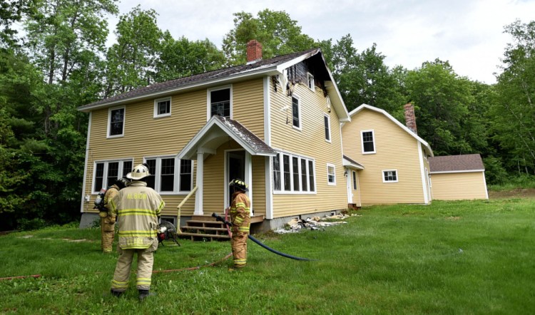 Firefighters from multiple agencies fought a house fire Thursday at 1191 Lakeview Drive in China.