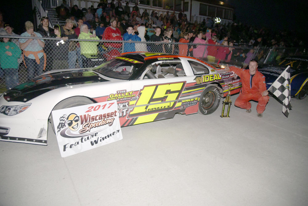 Nick Hinkley of Wiscasset poses by Victory Lane after winning a Late Model race June 10 at Wiscasset Speedway.