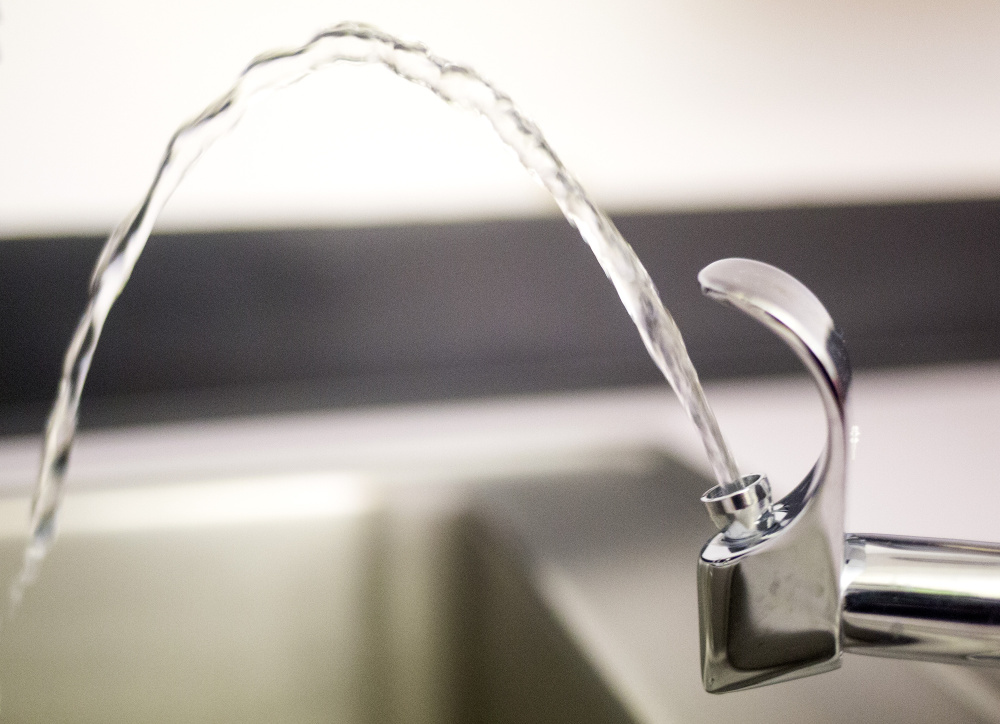 Water comes out of a new faucet at Benton Elementary School. The school had high lead levels when their water was tested and have since replaced many of the faucets and water fountains.