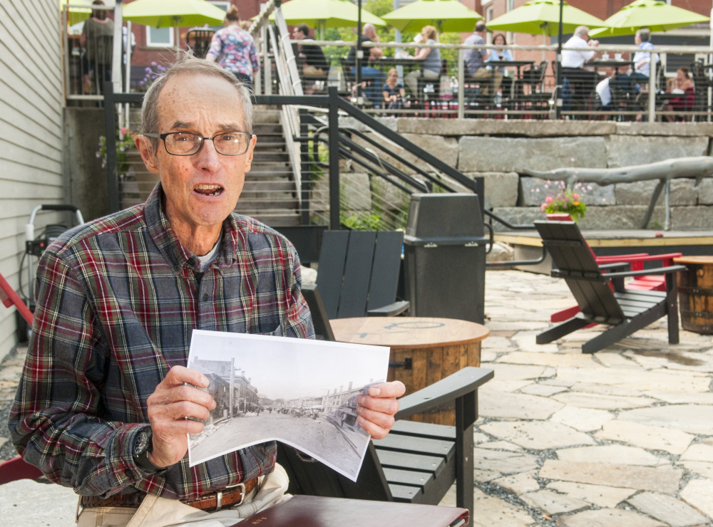 During an interview last week, Hallowell city historian Sam Webber talks about items from the old trolley line that ran through the city that were found during construction of the outdoor patio at the Quarry Tap Room in Hallowell.