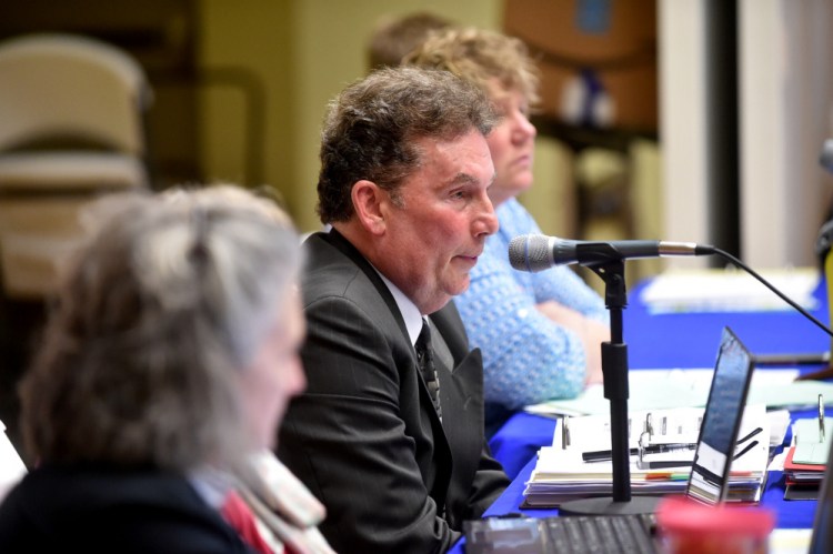 Tom Ward, superintendent of Regional School Unit 9, answers questions April 27 about the proposed school budget during an RSU 9 budget meeting at Mt. Blue High School in Farmington. On Thursday, the board debated cuts in the budget and settled on a $33.6 million proposal.