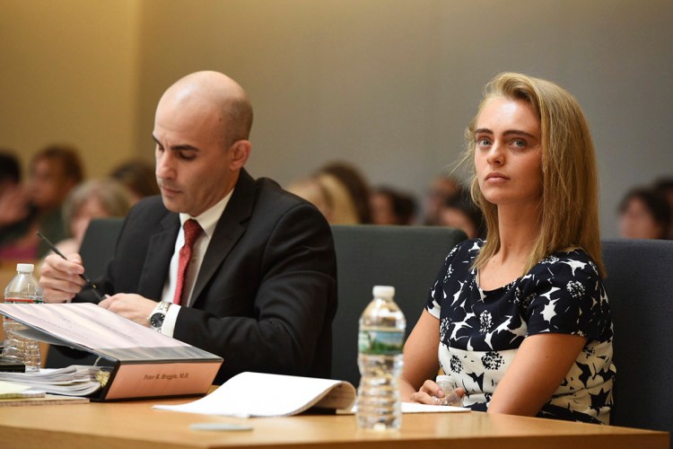 Defense Attorney Cory Madera takes notes as defendant Michelle Carter listens during her trial at Taunton Juvenile Court  in Taunton, Mass., Monday. 