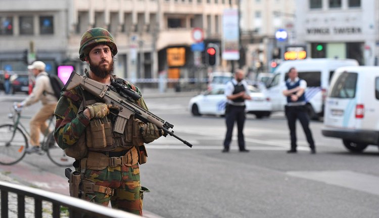 A Belgian Army soldier stands outside Central Station after a small explosion in Brussels on Tuesday.