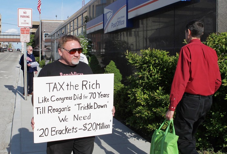 James Hodgkinson protests outside a post office in Belleville, Ill., in April 2012. 