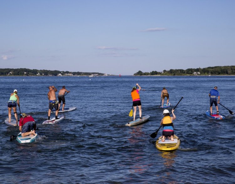 Stand-up paddle boarders can be seen in lakes and ocean waters throughout Maine. There are even races, like this one last August where competitors left from Willard Beach in South Portland and paddled to Ship's Cove at Fort Williams. But before you think about racing, it's time to work on the fundamentals.