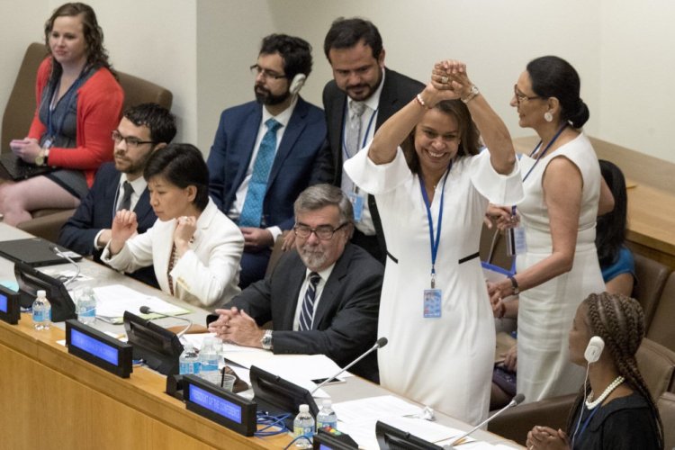 Costa Rican Ambassador Elayne Whyte Gomez, President of the United Nations Conference to Negotiate a Legally Binding Instrument to Prohibit Nuclear Weapons, reacts after a vote by the conference to ban nuclear weapons.
