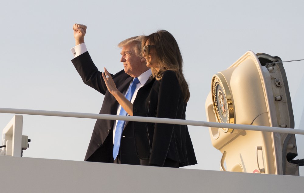 President Trump and first lady Melania Trump board Air Force One at Andrews Air Force Base, Md., en route to Paris for meetings meant to deepen ties that bind the U.S. and France.