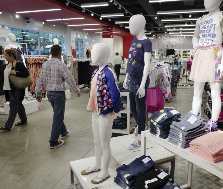 Cat & Jack jeans and tops, made with Repreve polyester fabric created from recycled plastic bottles, are shown on display at a Target store in New York on Friday.