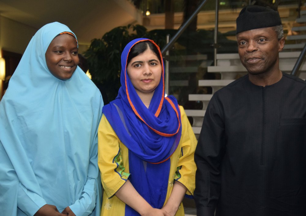 Malala Yousafzai, center, meets Monday with activist Amina Yusuf and  Nigeria's Acting President Yemi Osinbajo in Abuja, Nigeria.
Associated Press/ Azeez Akunleyan
