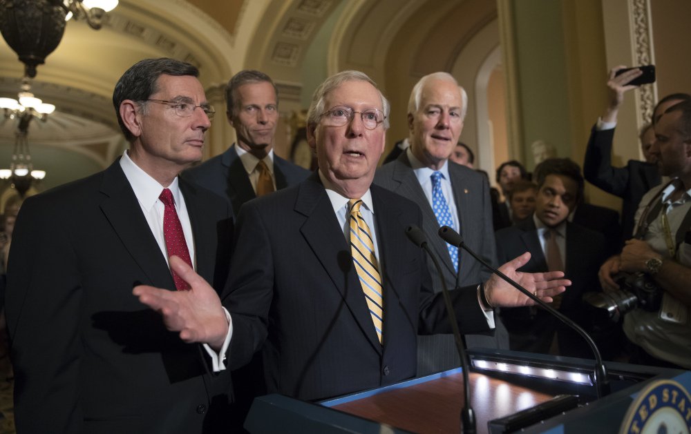 Senate Majority Leader Mitch McConnell of Ky., joined by, from left, Sen. John Barrasso, R-Wyo., Sen. John Thune, R-S.D., and Majority Whip John Cornyn, R-Texas, has offered the Senate an array of options on health care.
