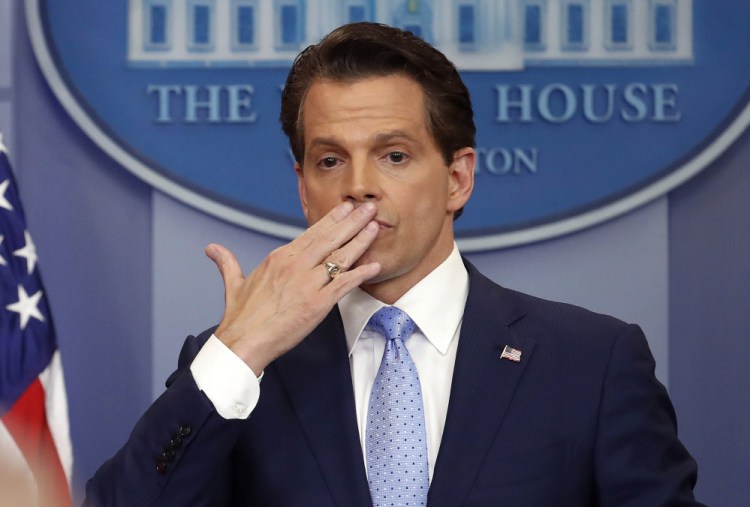 Short-lived White House communications director Anthony Scaramucci, right, blows a kiss during a press briefing in the White House on July 21. He's out of the job after just 11 days.