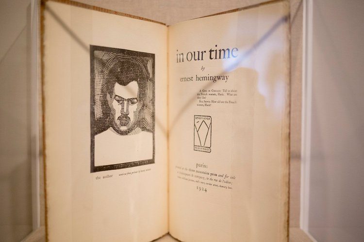 A rare book of Hemingway's that uses  a wood block print of Strater's portrait of him. The Ogunquit Museum of American Art exhibit is a series of a series of paintings, photographs, illustrated books and more that revolves around the friendship Between the two men - and it's demise. 