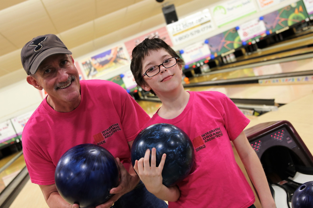Big Brother Rick Eskelund and his Little Brother Donald Riopelle team up to Bowl for Kids' Sake at Sparetime Recreation in Hallowell May 6. Eskelund was the event's highest individual fundraiser, collecting $1,570 in pledges to support Big Brothers Big Sisters of Mid-Maine which matched them two years ago.