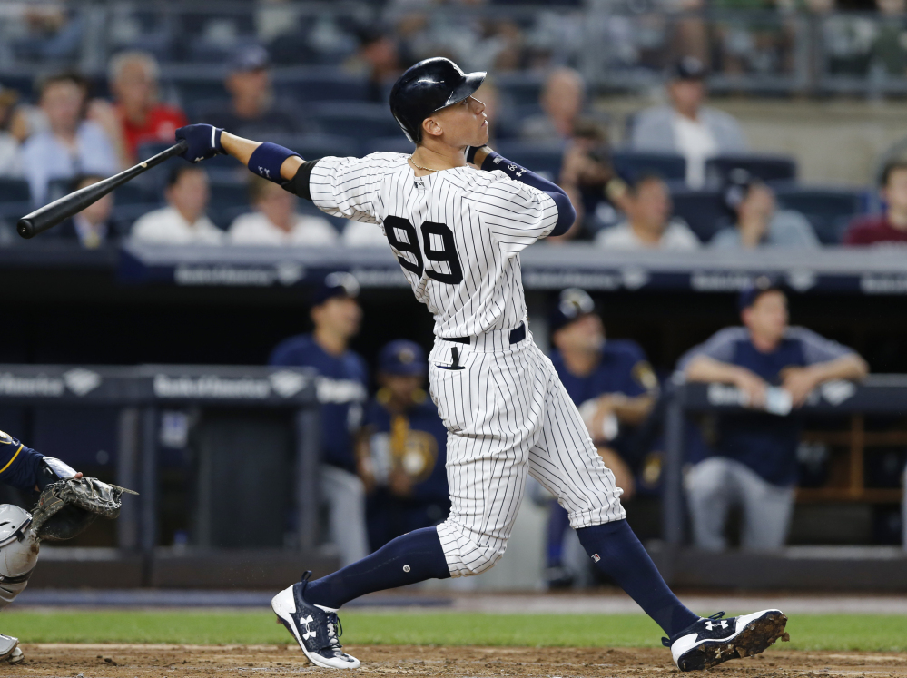 New York Yankees slugger Aaron Judge watches his fifth-inning solo home run against the Brewers in New York. This time last year, Aaron Judge had played exactly zero big-league games.