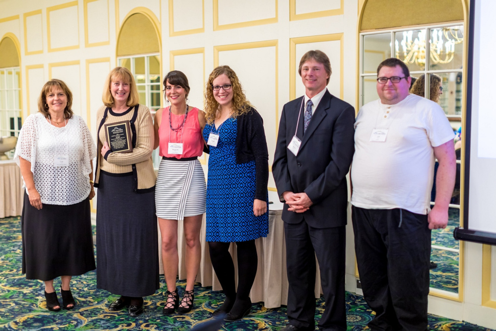 James R. Schmidt Award Winner Lisa Smith and Humane Society Waterville Area. From left are Lisa Soucie, Lisa Smith, Maggie Bryant, Morgan Place, Darryl Bowles and Josh Fates.