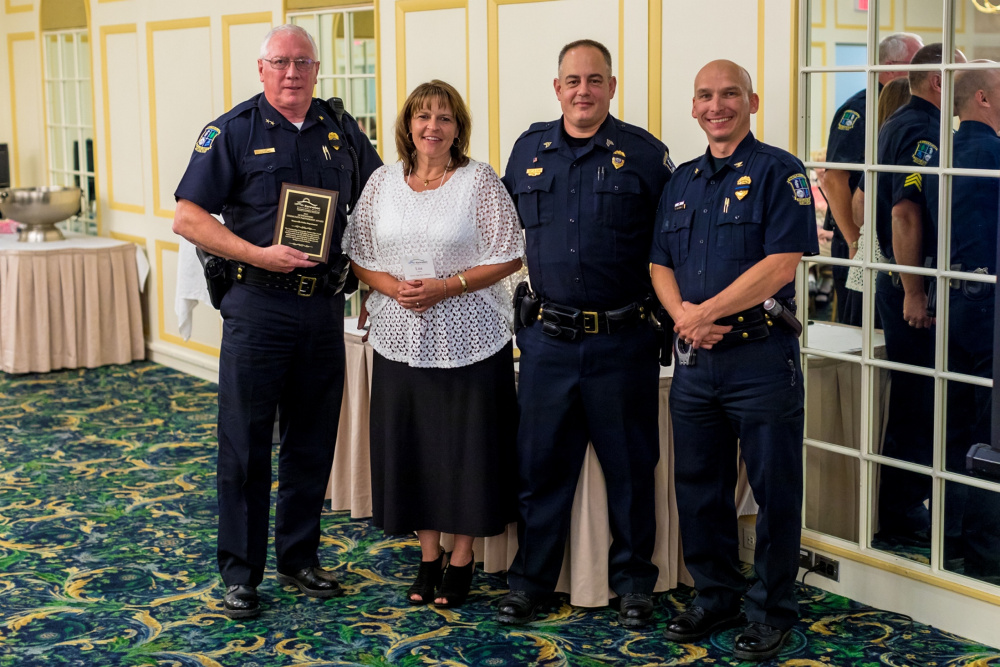 Outstanding Community Partnership Award Winner Waterville Police Department. From left are Chief Joseph Massey, Lisa Soucie, Sgt. Dan Goss and Deputy Chief William Bonney.