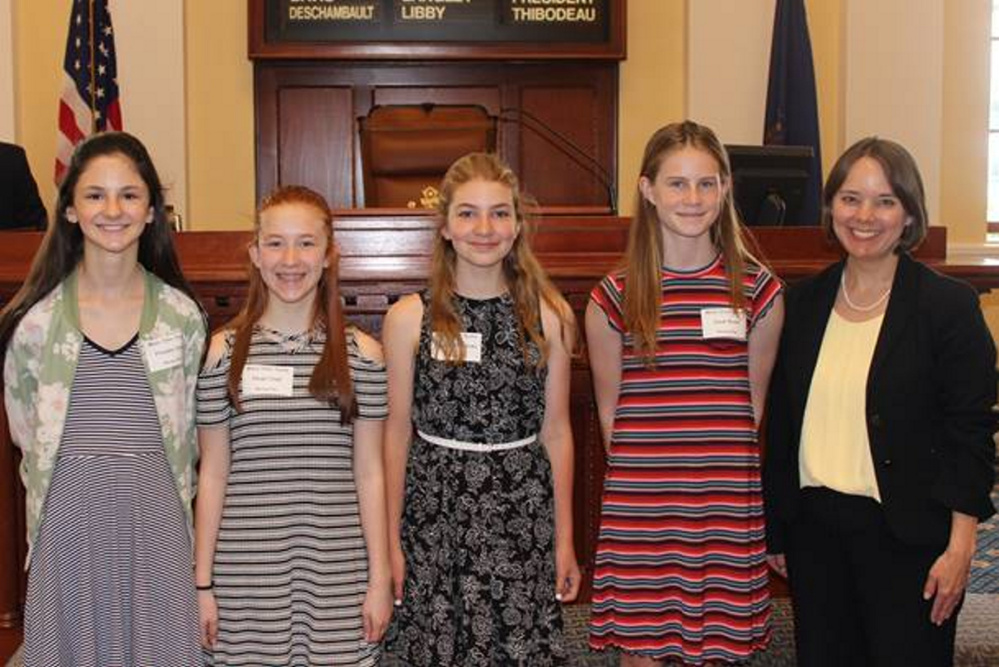 Winthrop Middle School students, from left, are Pheobe Dow, Aleah Child, Julia Letorneau and Josie Nuce with Sen. Shenna Bellows.