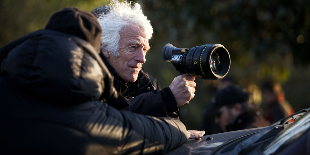 Director of Photography Roger Deakins finds the shot on the set of "Prisoners" (2013).