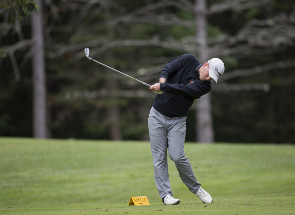 Jack Wyman hits the ball during the final round at the Maine Amateur golf tournament at the Brunswick Golf Club on Thursday. Wyman, of South Freeport, who plays out of the Portland Country Club, won the tournament. He is the first left-handed player to ever win in the tournament.