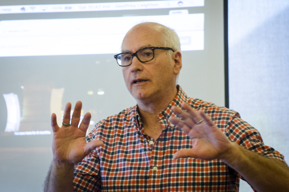 Geoffrey Leighton, of Durham, a University of Southern Maine instructor, discusses activist visual art Saturday at a Maine International Film Festival workshop at the Waterville Public Library.