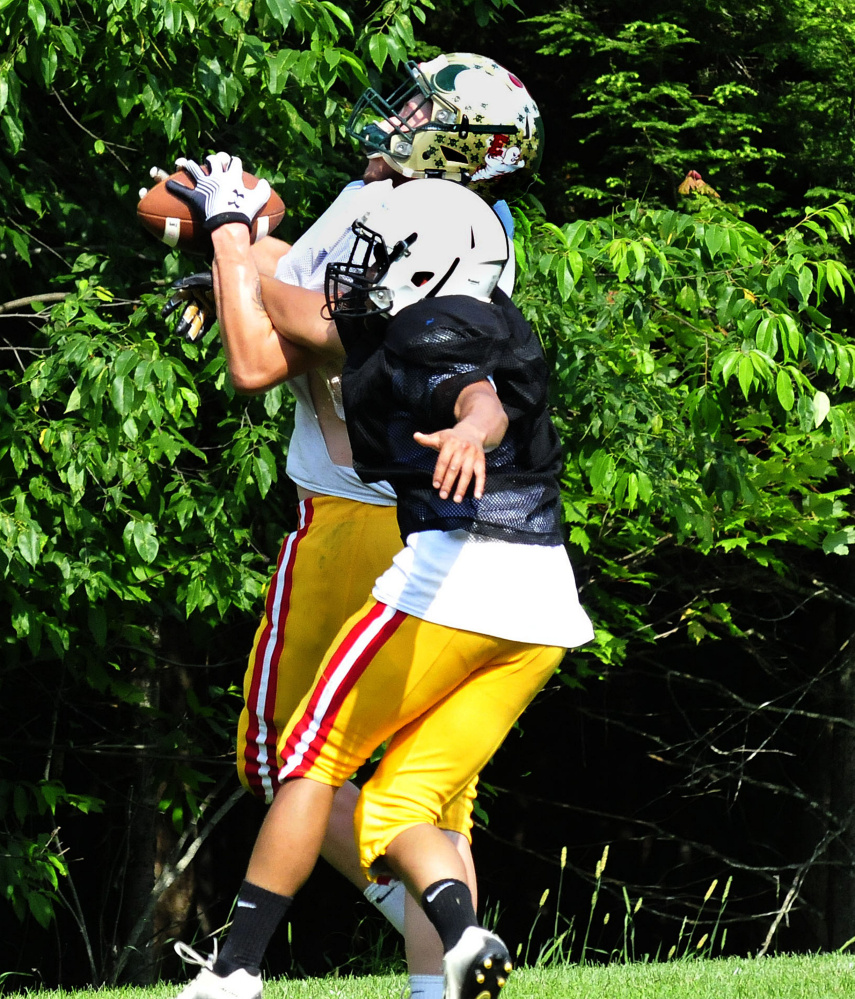 East team player Colby Furrow makes a catch during practice for the Lobster Bowl last week. Furrow raised $11,600 for Shriner's Hospitals for Children, thought to be a record in the 28-year history of the game.