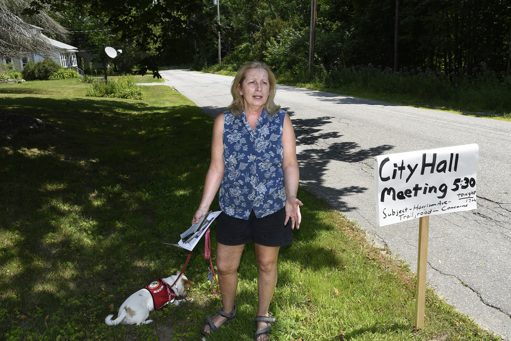 Barbara Jenner discusses the Harrison Avenue Nature Trail across from her home in Gardiner on Monday. Some neighbors are concerned by traffic near the trail.