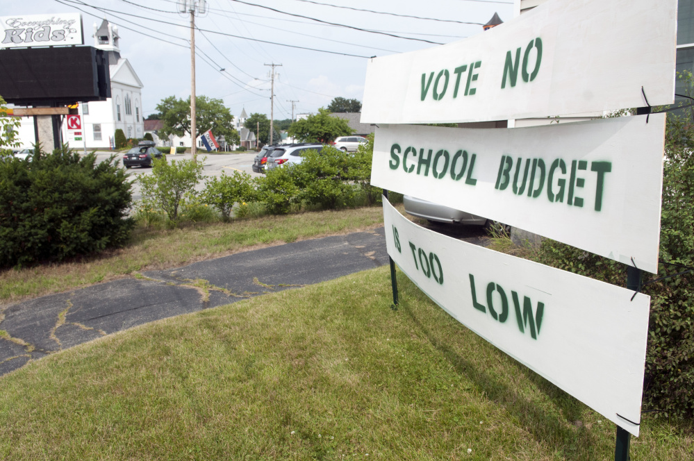David Hughes recently put out a sign saying, "Vote No: School Budget Is Too Low" at his home, on corner of Main and Royal streets in Winthrop.