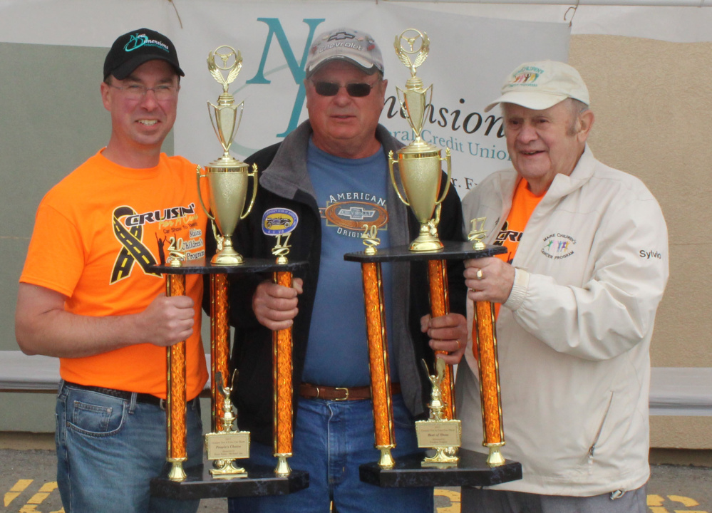Ryan Poulin, left, president/CEO of New Dimensions Federal Credit Union, with Lincoln Nye, winner of People's Choice and Best of Show trophies, and Sylvio Normandeau, right.