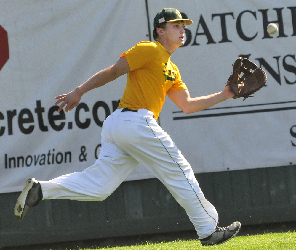 Former Messalonskee star Jake Dexter reaches for a fly ball during practice Wednesday at Goodall Park in Sanford. Dexter plays on the Sanford Mainers in the New England Collegiate League.
