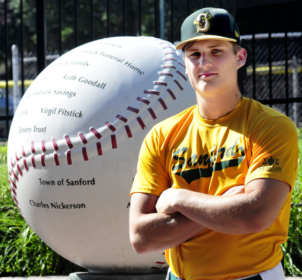 Former Messalonskee star Jake Dexter poses in front of Goodall Park in Sanford prior to a game Wednesday. Dexter plays for the Sanford Mainers in the New England Collegiate Baseball League.