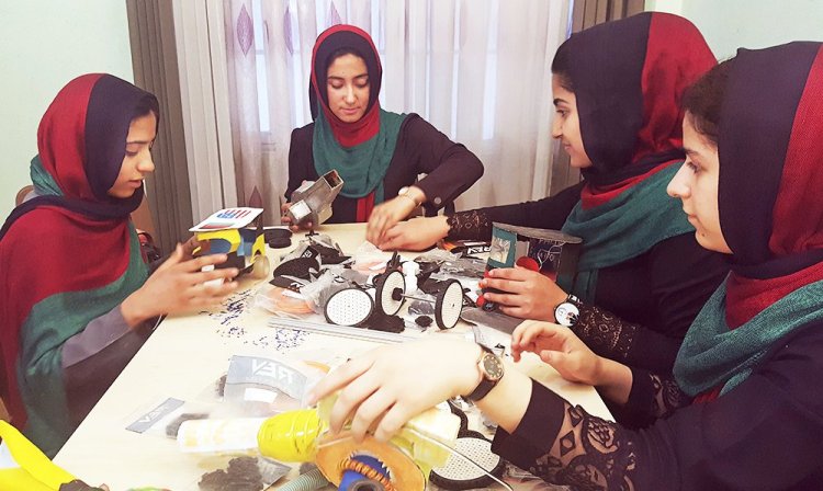 Teenagers from the Afghanistan Robotic House, a private training institute, practice at the Better Idea Organization center, in Herat, Afghanistan, on July 6, 2017. President  Trump intervened to allow a group of six female students into the country to participate in a robotics competition. 