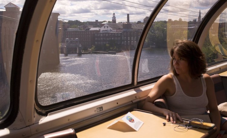 Kerstin Egenhofer rides in an original 1955 dome observation car while traveling from Boston on the Downeaster to spend a day off of work in the Portland area. "I wanted to make an experience out of my trip," Egenhofer said. "This put the bow on it."