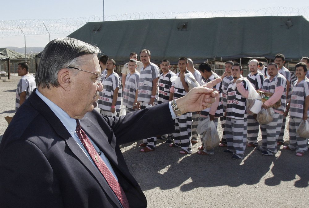 In this Feb. 4, 2009 file photo, then-Maricopa County, Ariz., Sheriff Joe Arpaio orders approximately 200 convicted illegal immigrants handcuffed together in Tent City in Phoenix for incarceration until their sentences are served and they are deported to their home countries.
Associated Press/Ross D. Franklin