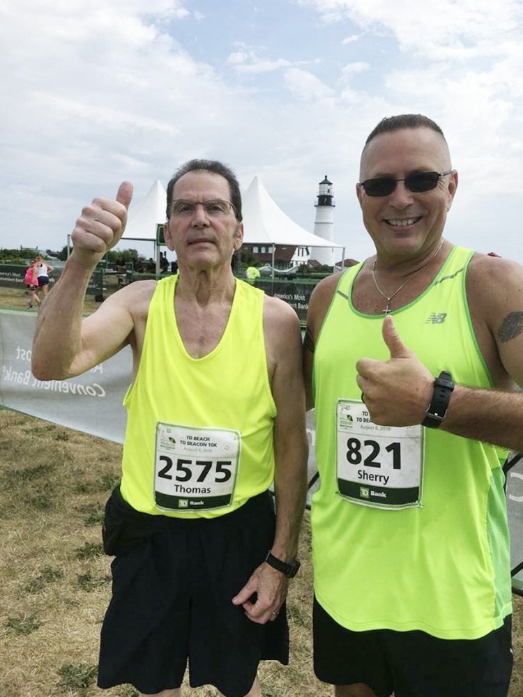 Tom and Shawn Carll ran in last year's Beach to Beacon 10K, with Shawn wearing the race bib that belonged to his mother, Sherry Carll.