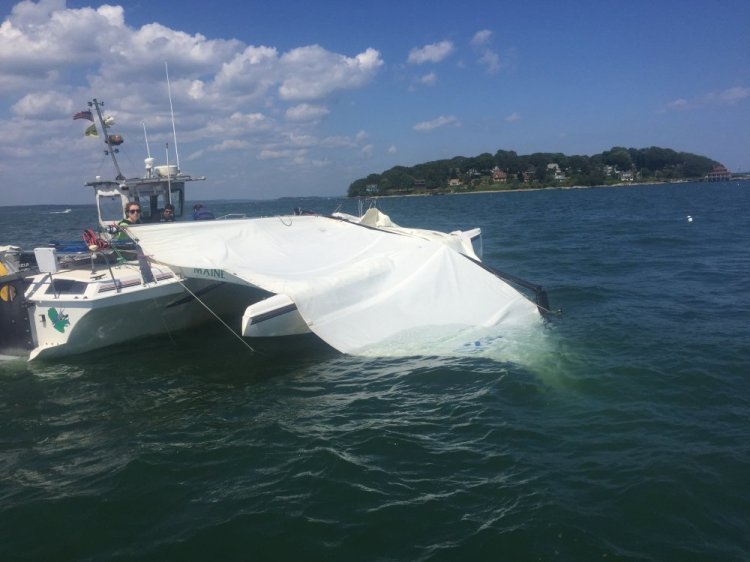 The mast of the Triceratops, a trimaran that berths at South Port Marine in South Portland, snapped Wednesday, severely injuring a woman as she sailed the vessel. The identity of the woman, who was taken to Maine Medical Center, was unavailable late Wednesday.