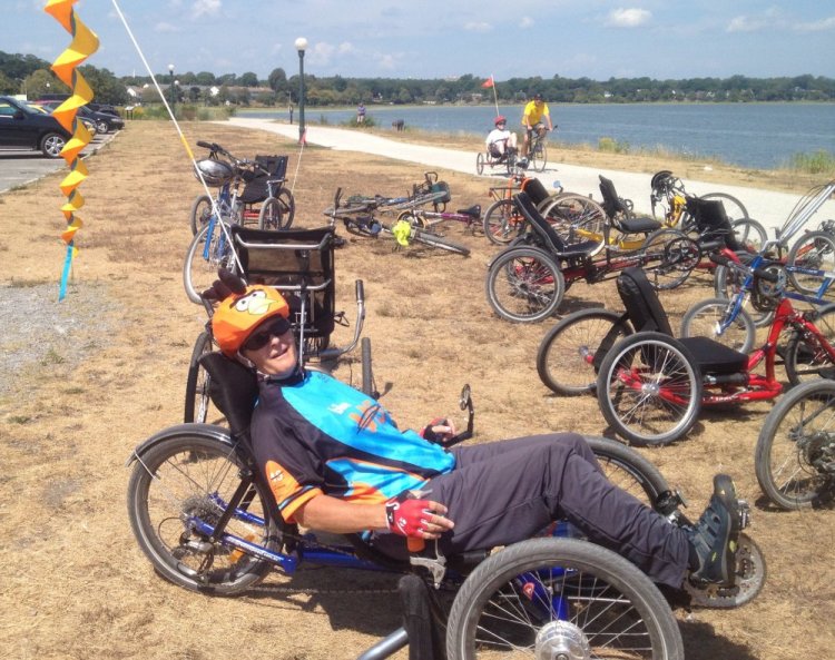Max Michaud takes a break from her training with Maine Adaptive Sports & Recreation at the Back Cove Trail in Portland.