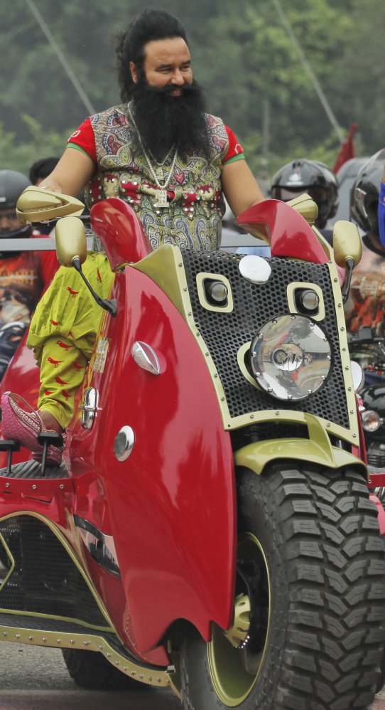 A guru who calls himself Saint Dr. Gurmeet Ram Rahim Singh Insan arrives in New Delhi last year.