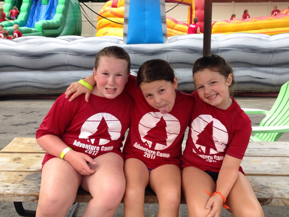 Campers at Adventure Camp in Waterville spent Aug. 4 at Roy's Inflatable Water Park in Madison. From left are Sarah True, of Cornville, Hannah Gurney MacLaughlin, of Waterville, and Lily Lamport, of Waterville.
