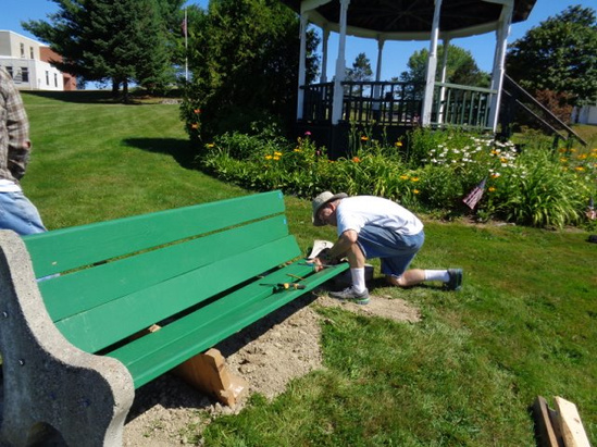 Volunteer David Holden gets ready to set the bolts into the new boards he prepared for the benches on the property surrounding the bandstand and the Veterans Memorial in Jefferson. Holden did all the prep and paint work on the boards and the new supports for the benches. Marilyn and Ron Speckmann assisted with the final fitting into the side supports. The gardens around the bandstand, seen in the background, and those on the Veterans Memorial site have been cared for by a small, but dedicated group of volunteers. For more information or to volunteer, call 549-5258.
