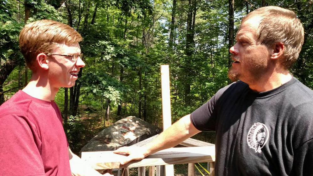 Thomas Robinson, left, of Freeport, interviewed Camp Director Butch Dawbin.