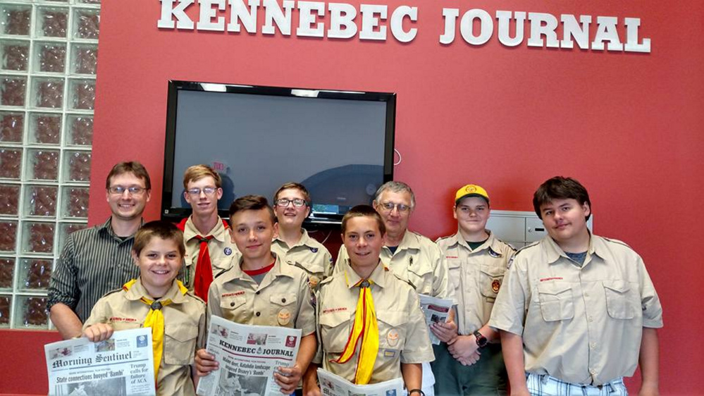 Front, from left, are Ben Pentilla, Braden Mayo and Harrison Quimby. Back, from left, are Kennebec Journal/Morning Sentinel Managing Editor Scott Monroe, Thomas Robinson, Ben Lamontagne, Scout Leader Ronald Mansir, Jake Viger and Zach Truman.