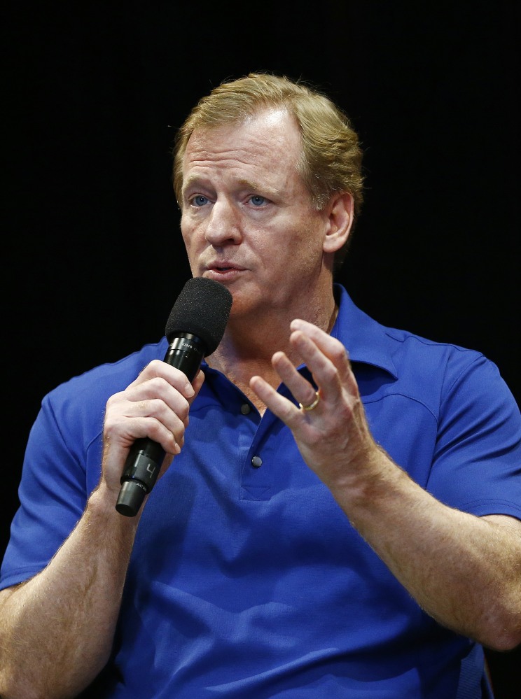 NFL Commissioner Roger Goodell talks with Arizona Cardinals season ticket holders during an event at University of Phoenix Stadium on Monday in Glendale, Arizona.