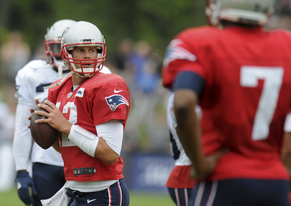 New England Patriots quarterback Tom Brady looks to throw during a joint practice with the Houston Texans on Wednesday in White Sulphur Springs, West Virgina.