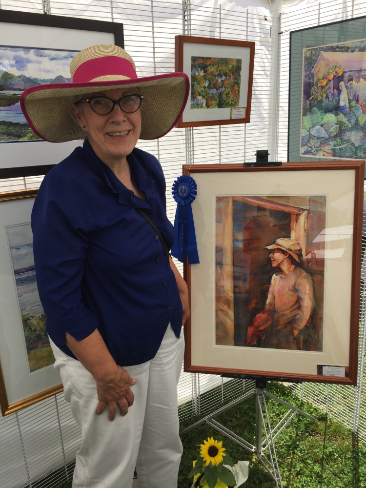 Sandra Pealer won first place in the 2-D category at the Art in August artists and artisans exhibition in Oquossoc Park on Aug. 3.